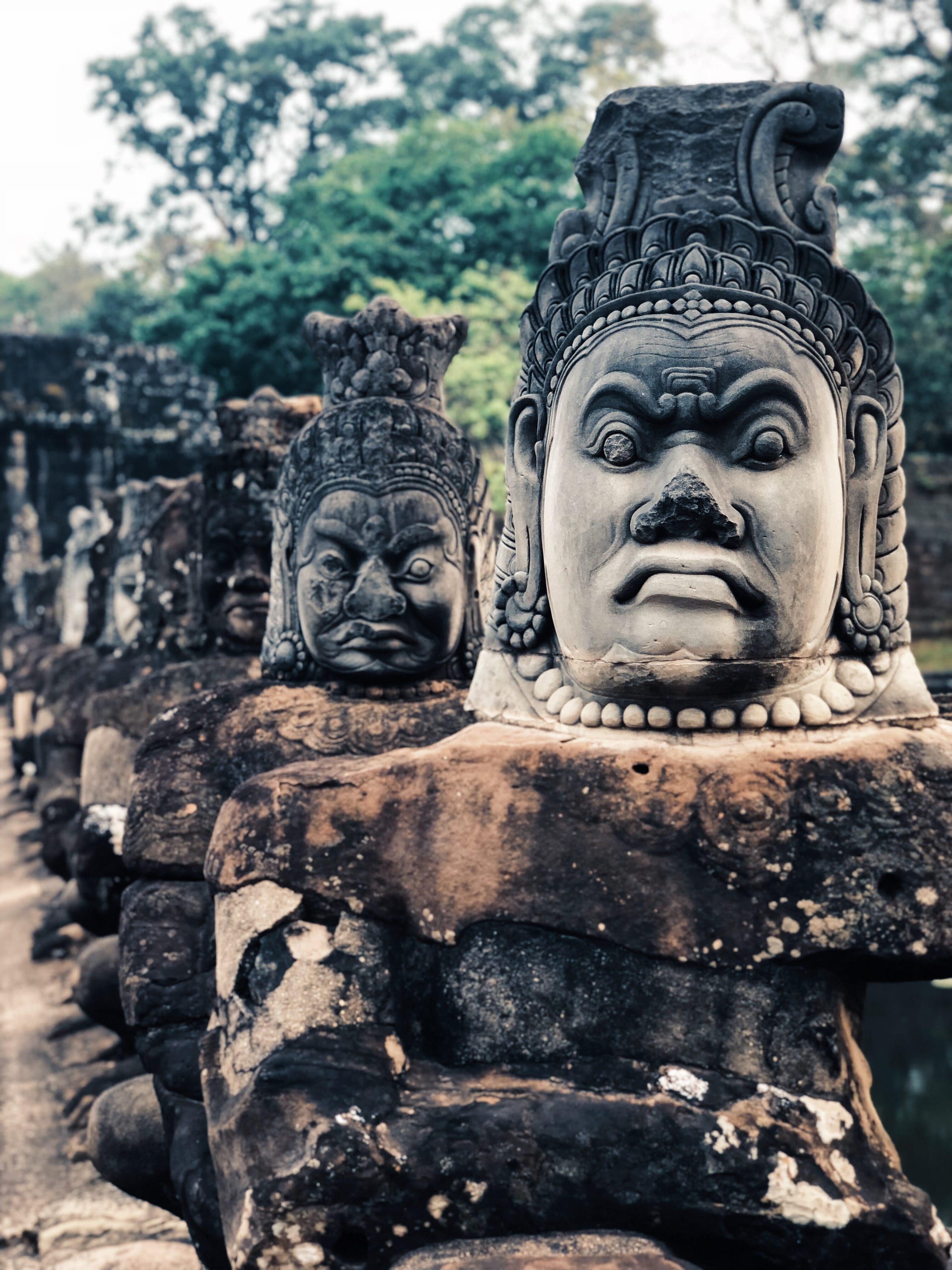 Stone faces lining the causeway