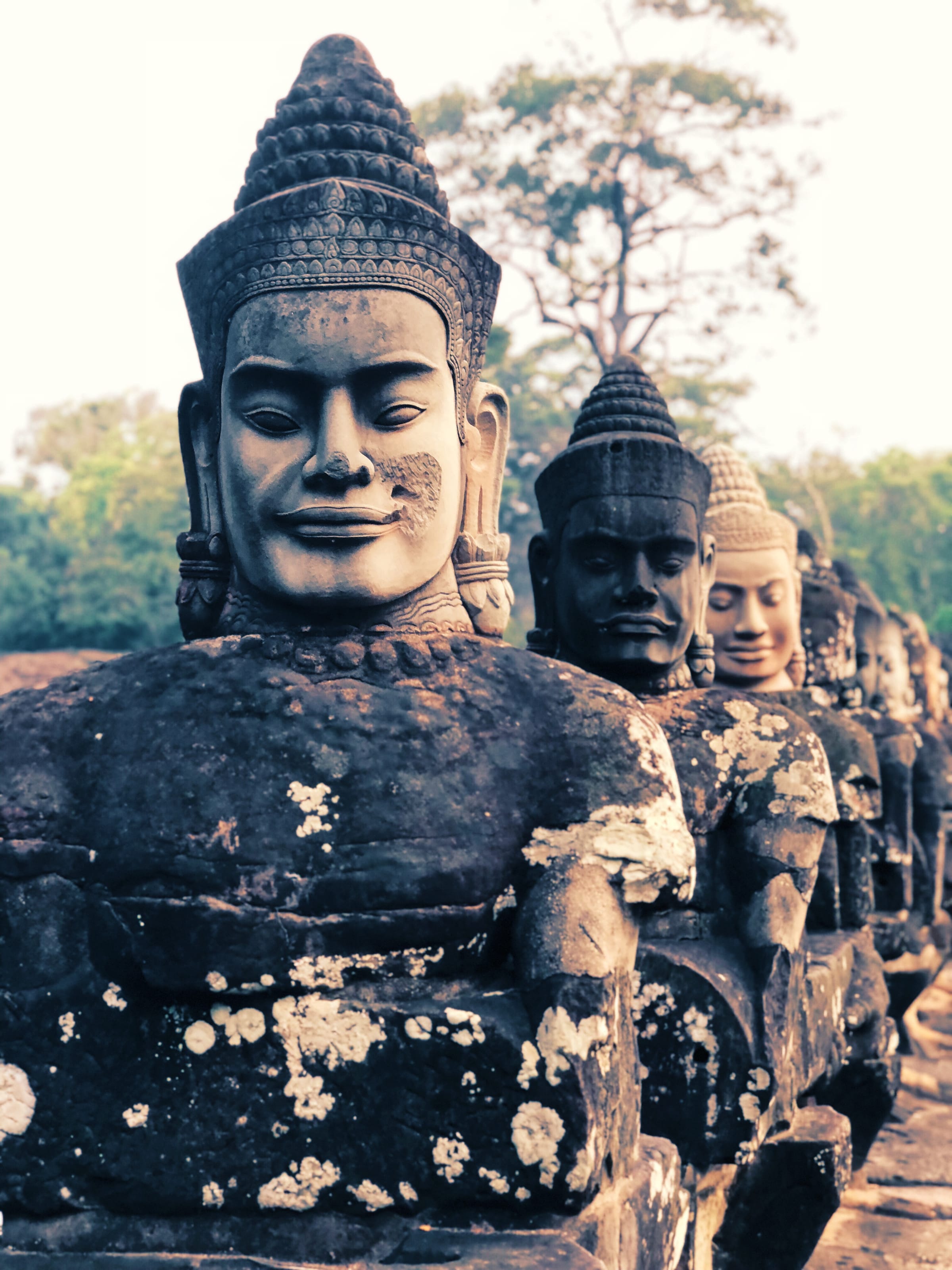 Stone faces lining the causeway